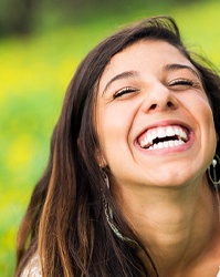 Woman smiling outside