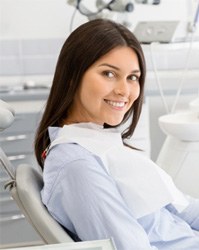 Female patient visiting emergency dentist in Boston, MA