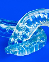 Pair of customized mouthguards for protecting teeth from bruxism