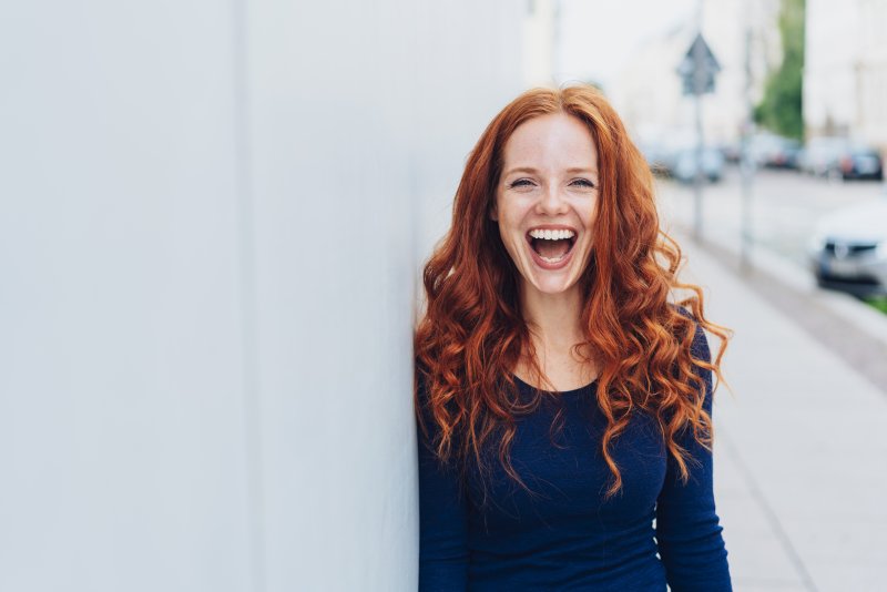 Woman smiling on the street